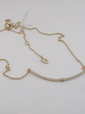 RALPH LAUREN Gol-tone Pave Curved Bar Necklace.